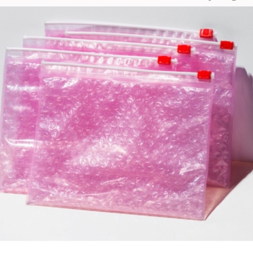 Glossier Pouches